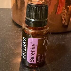 Doterra Serenity Essential Oil Bottle with Purple Label and Black Cap